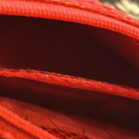 Michael Kors cosmetic bag or you could use it as a small purse. Beautiful red.‌ - Picture 4 of 6